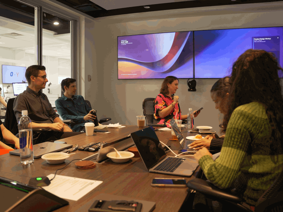 A image of a concrete sphere, balanced between two other larger spheres